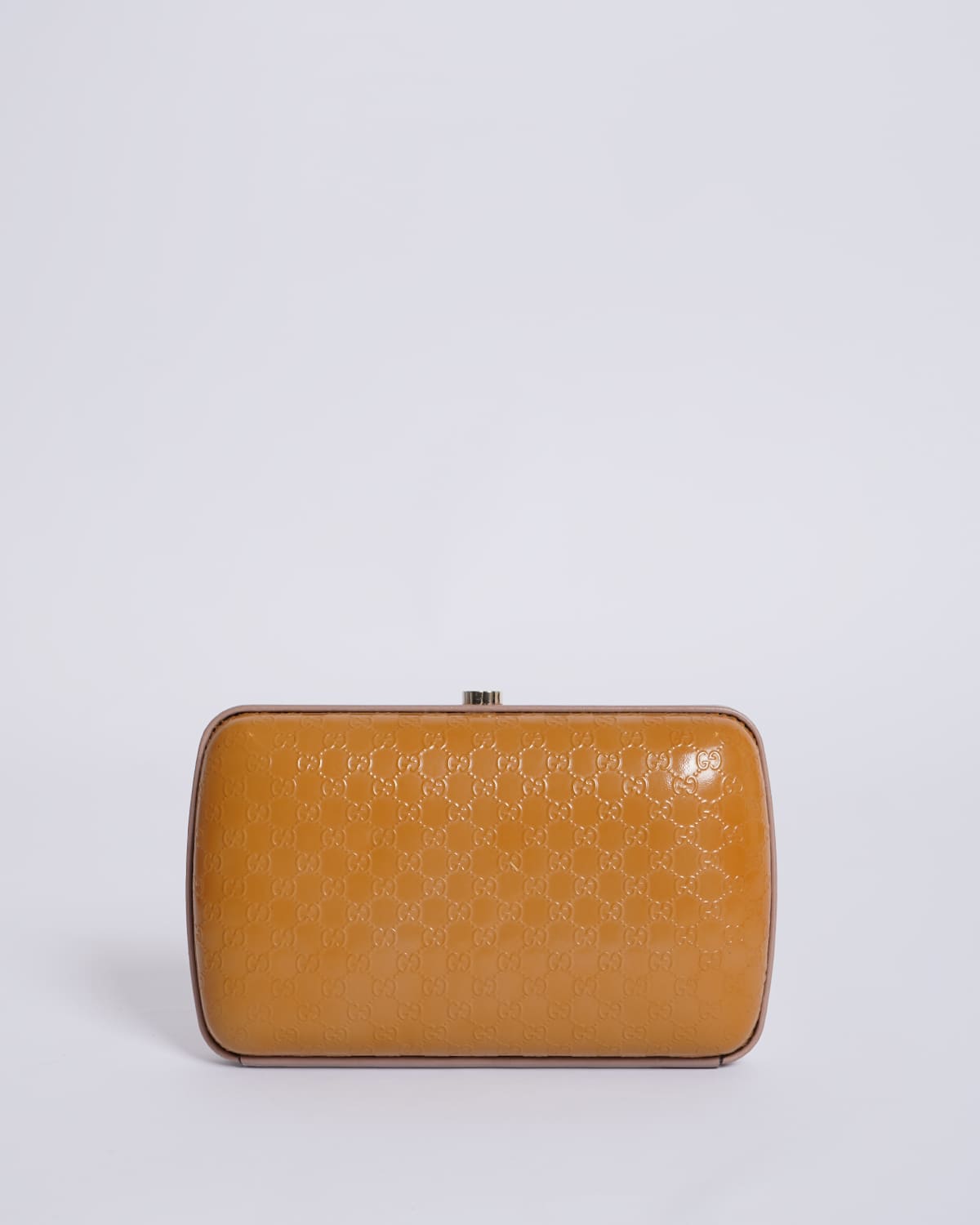 Gucci Monogram Leather Clutch