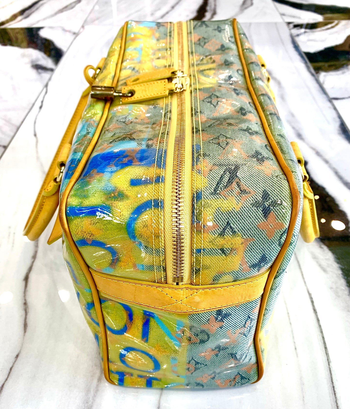 LOUIS VUITTON MULTI-COLOR MONOGRAM PULP WEEKENDER PM