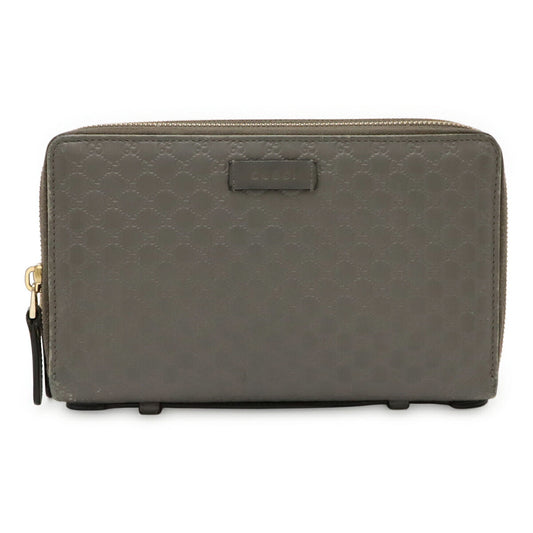Gucci Microguccissima Leather Clutch Bag