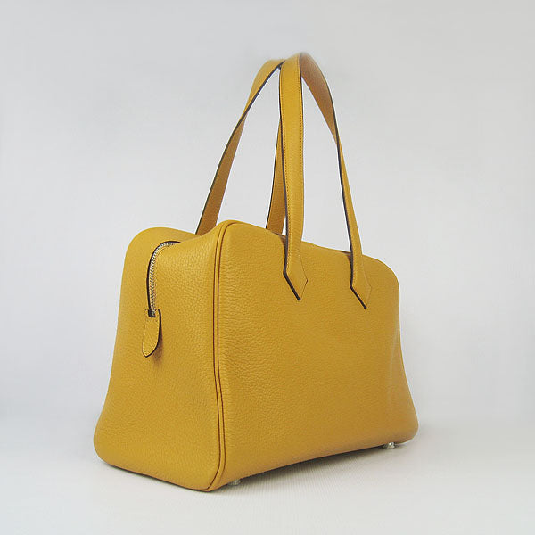 Luxury Hermes Togo leather handbag yellow