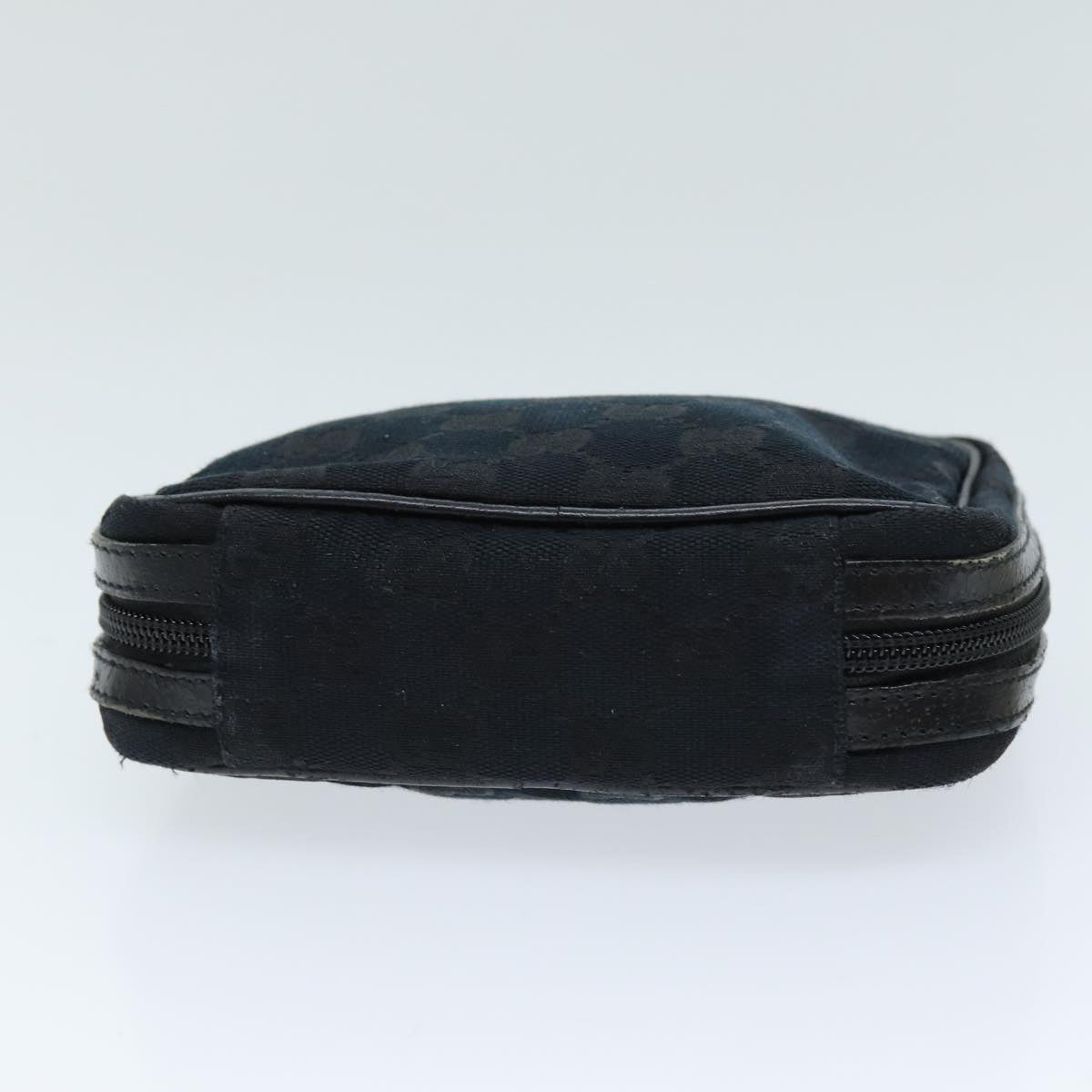 Gucci Monogram Canvas Clutch