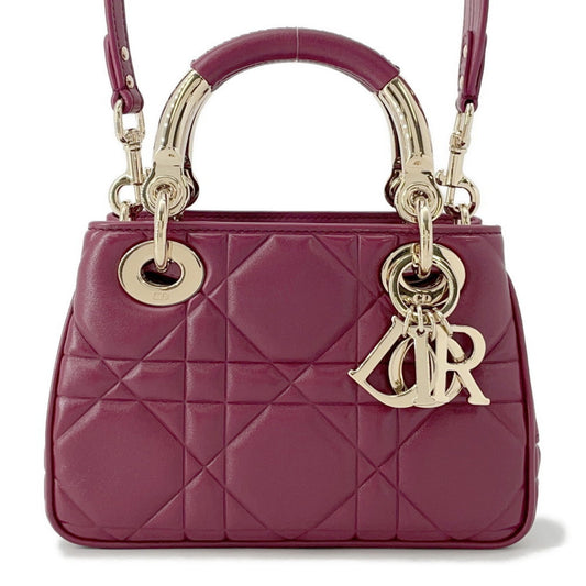 Christian Dior Bordeaux Champagne Gold Leather Handbag ()