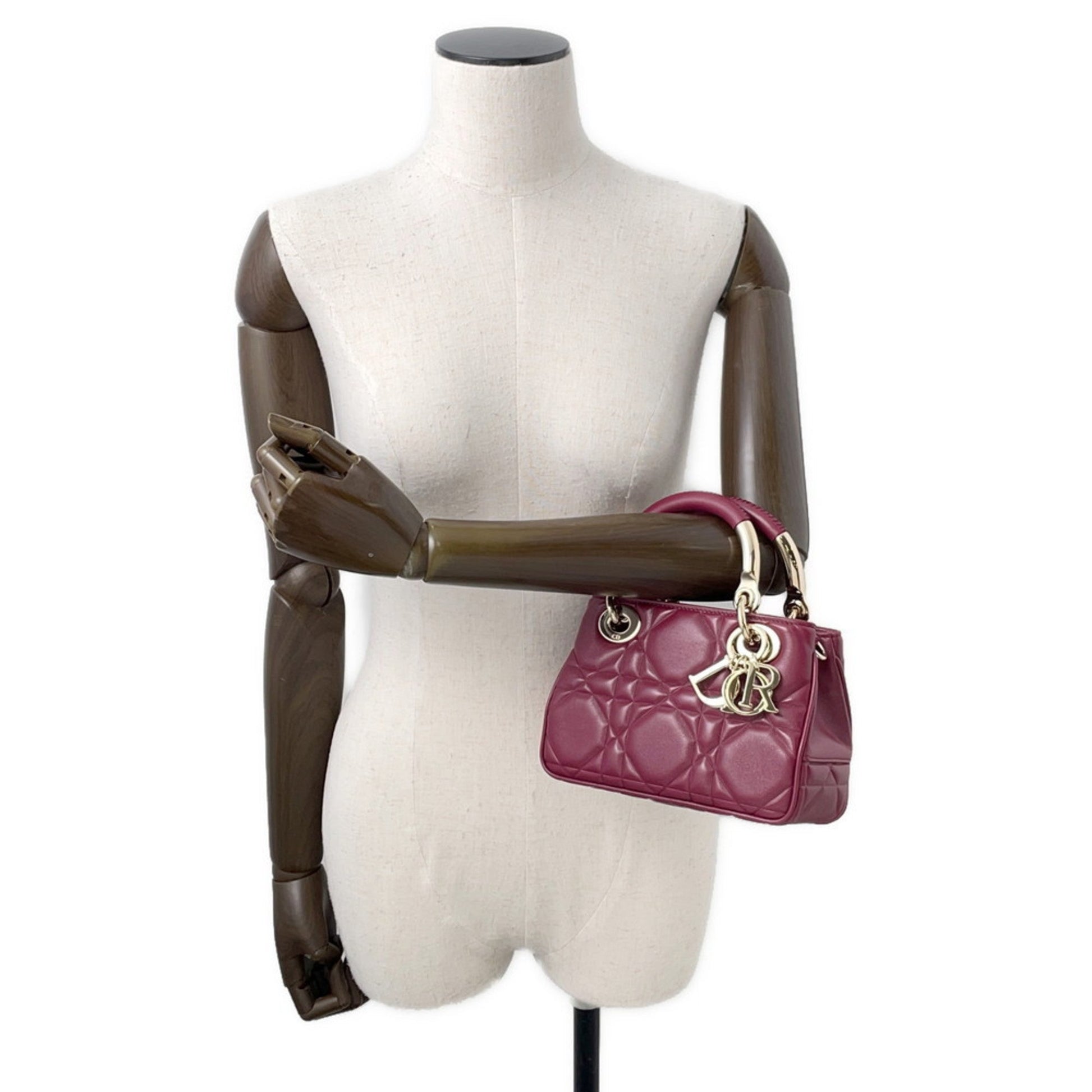 Christian Dior Bordeaux Champagne Gold Leather Handbag ()