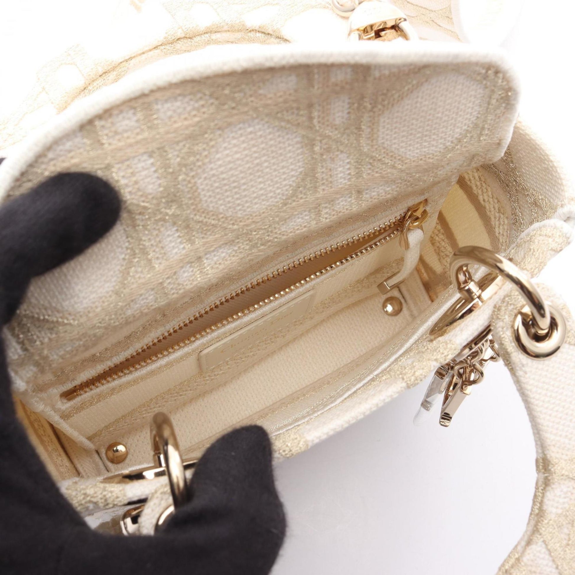 Christian Dior Gold White Canvas Handbag ()