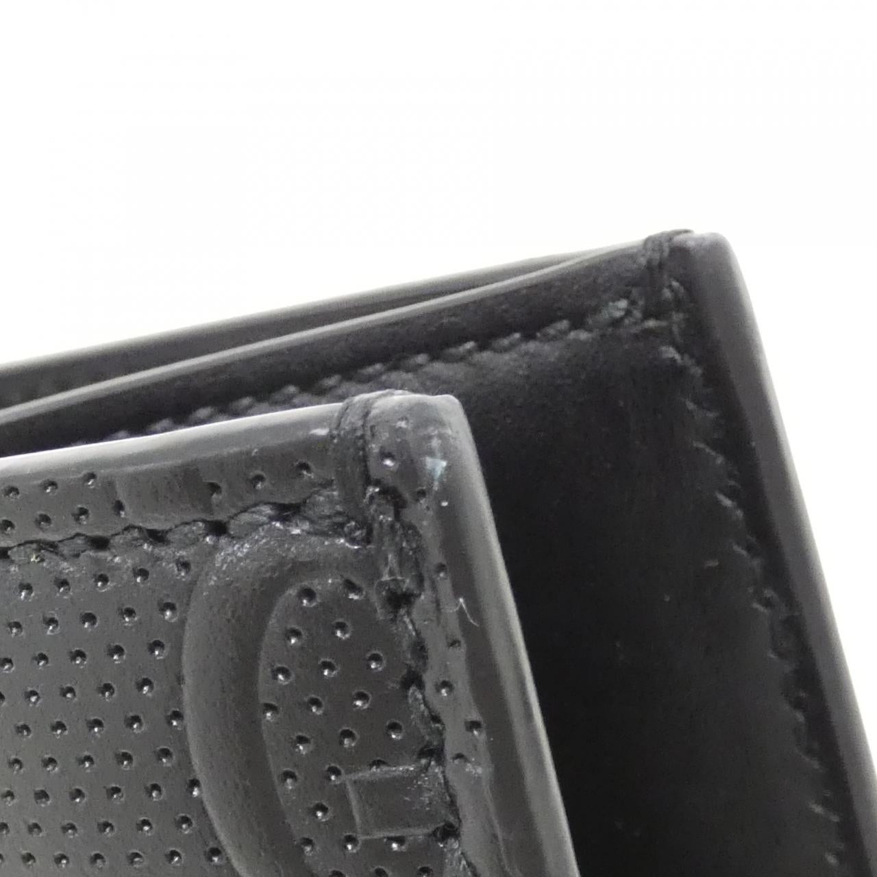 Gucci GG Embossed Leather Bag