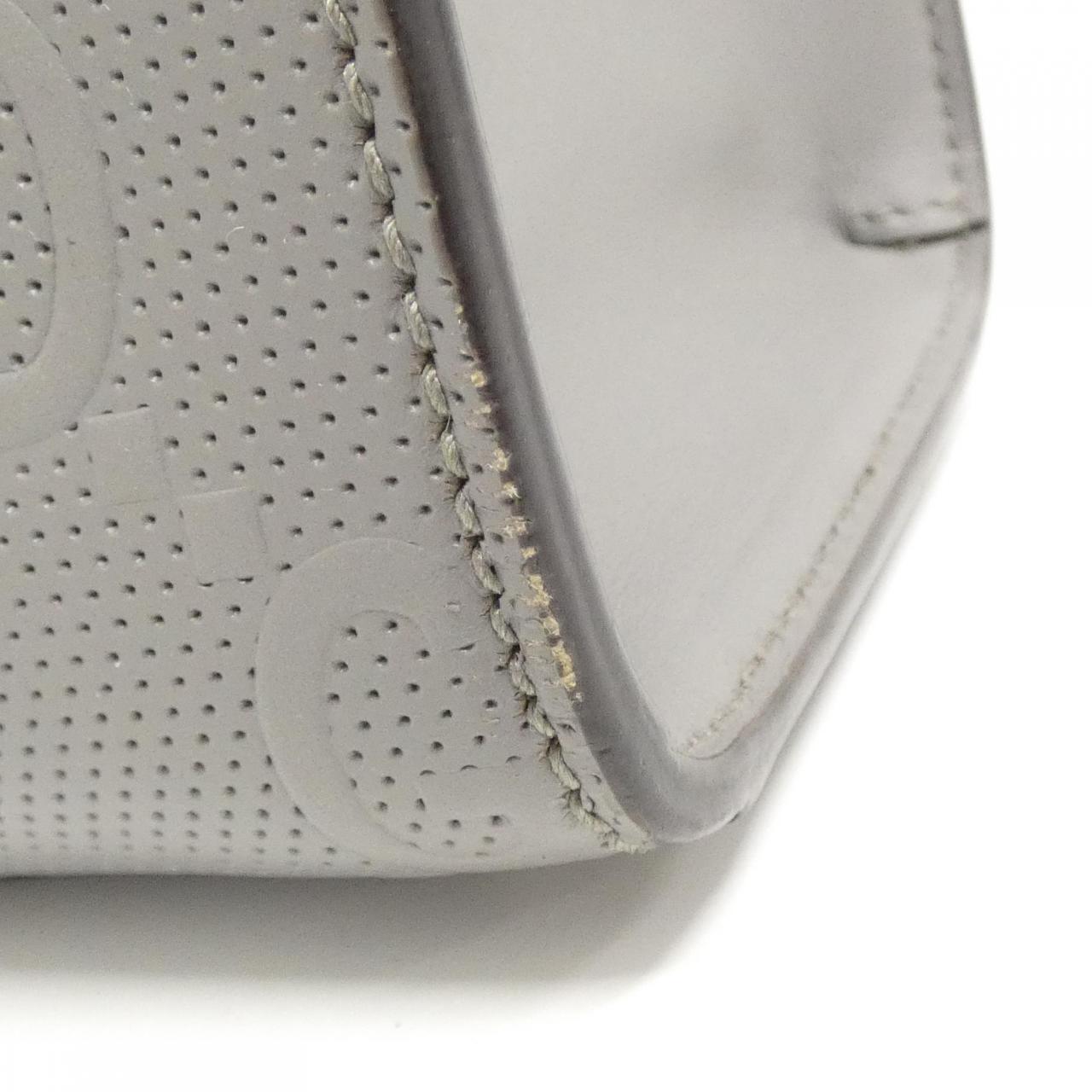 Gucci GG Embossed Leather Bag