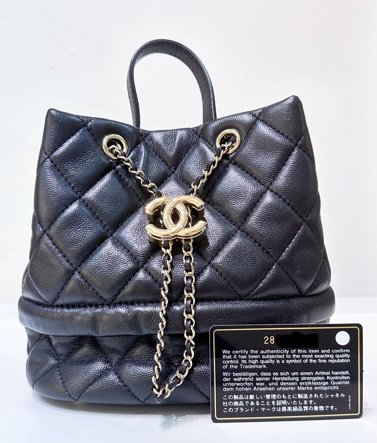 CHANEL Caviar Quilted Rolled Up Bucket Drawstring Bag Black