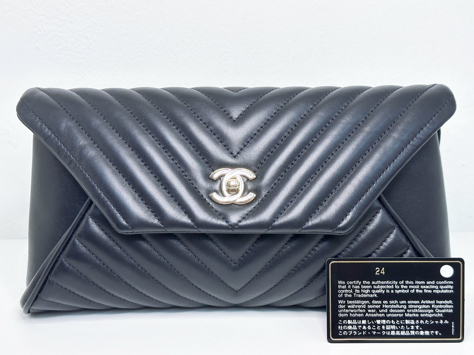 Chanel Black Chevron Lambskin Fold Up Again Clutch 2432 holo card