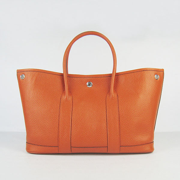 Luxury Hermes garden party handbag orange