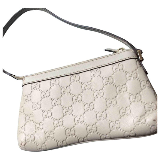 Gucci beige leather clutch bag