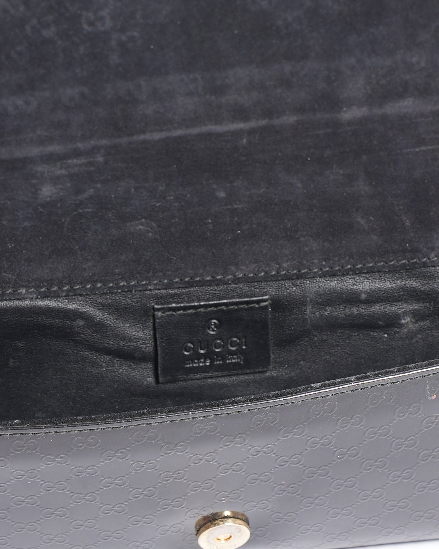 Gucci Monogram Leather Clutch