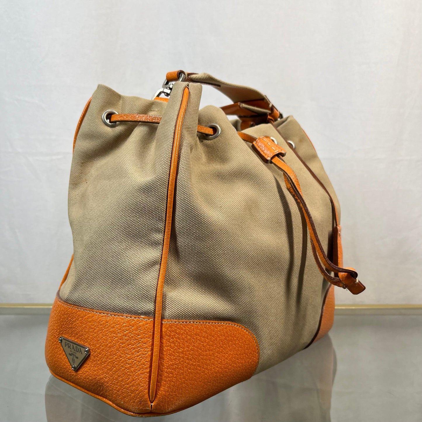 Prada Leather & Canvas Drawstring Orange Bucket Bags