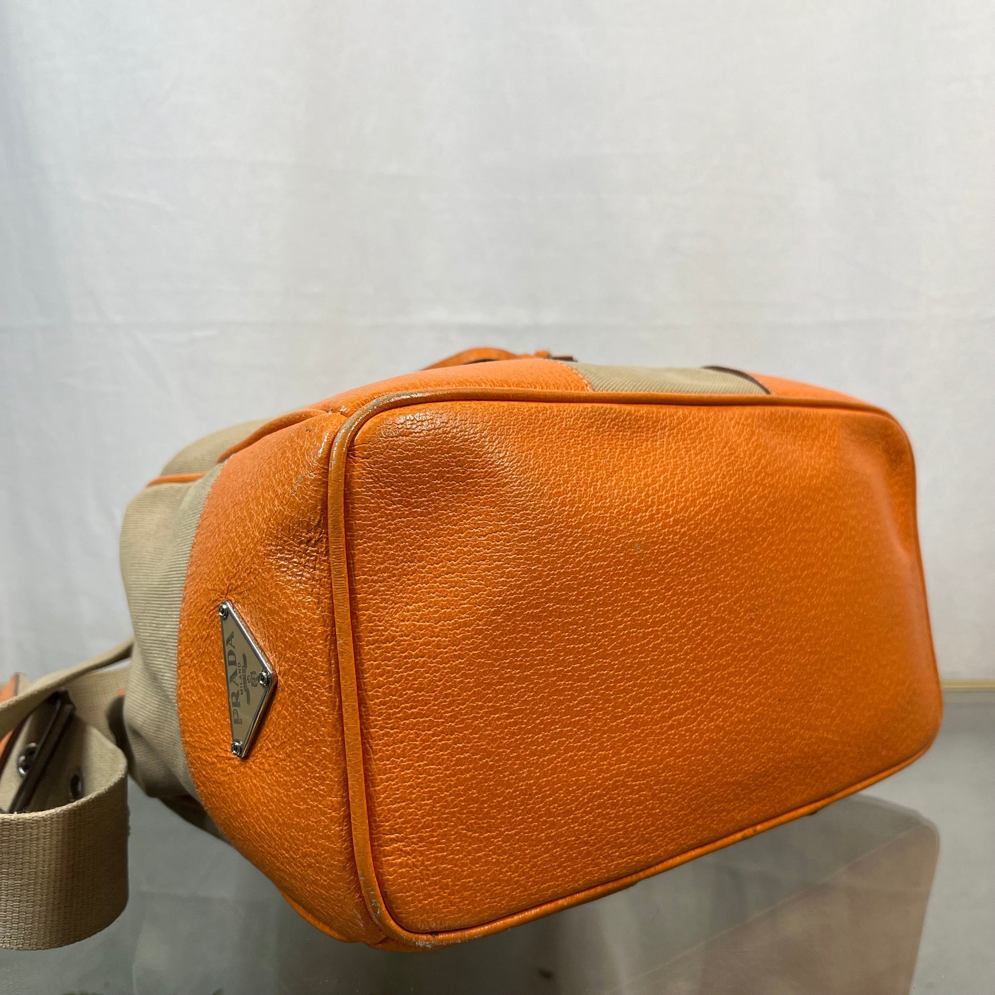 Prada Leather & Canvas Drawstring Orange Bucket Bags