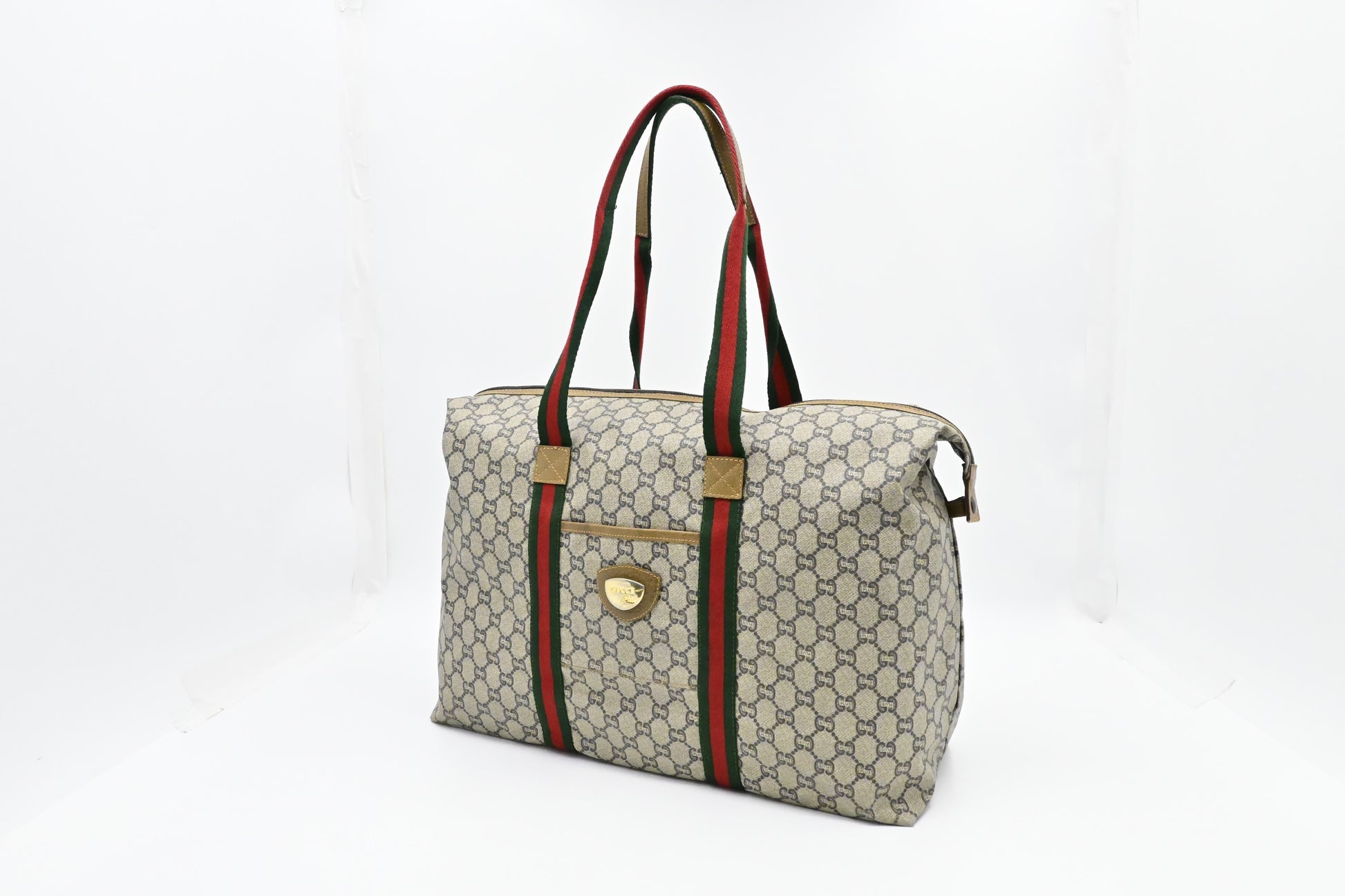 Gucci Plus Zipped Travel Bag in GG Plus Coated Canvas