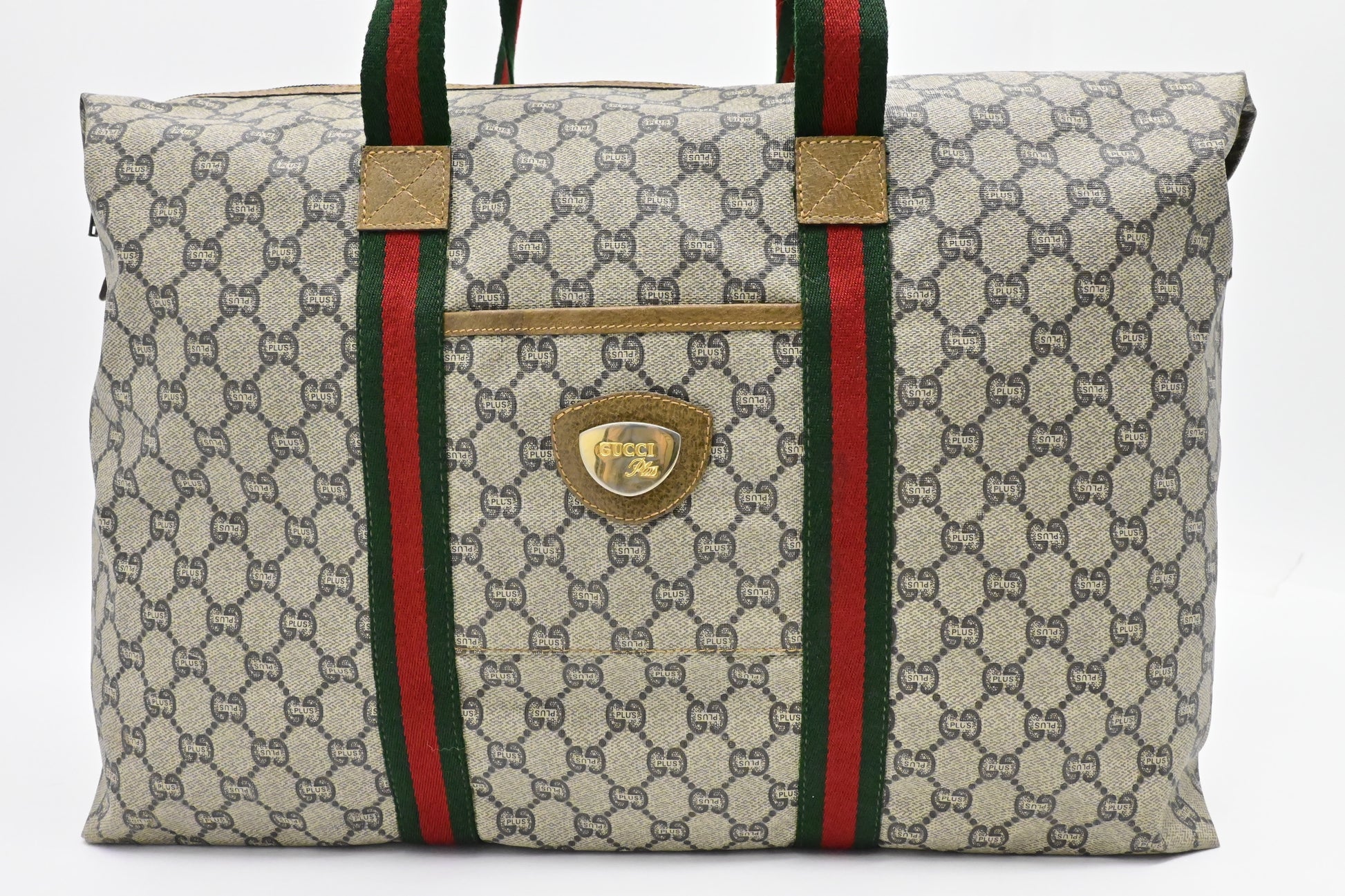 Gucci Plus Zipped Travel Bag in GG Plus Coated Canvas