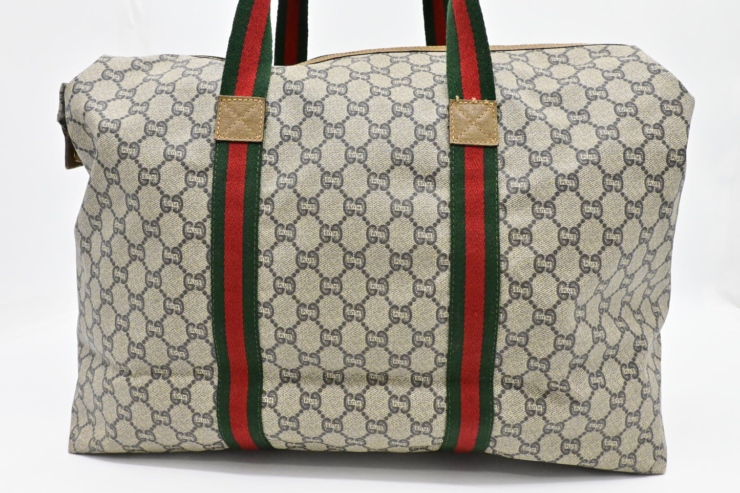 Gucci Plus Zipped Travel Bag in GG Plus Coated Canvas