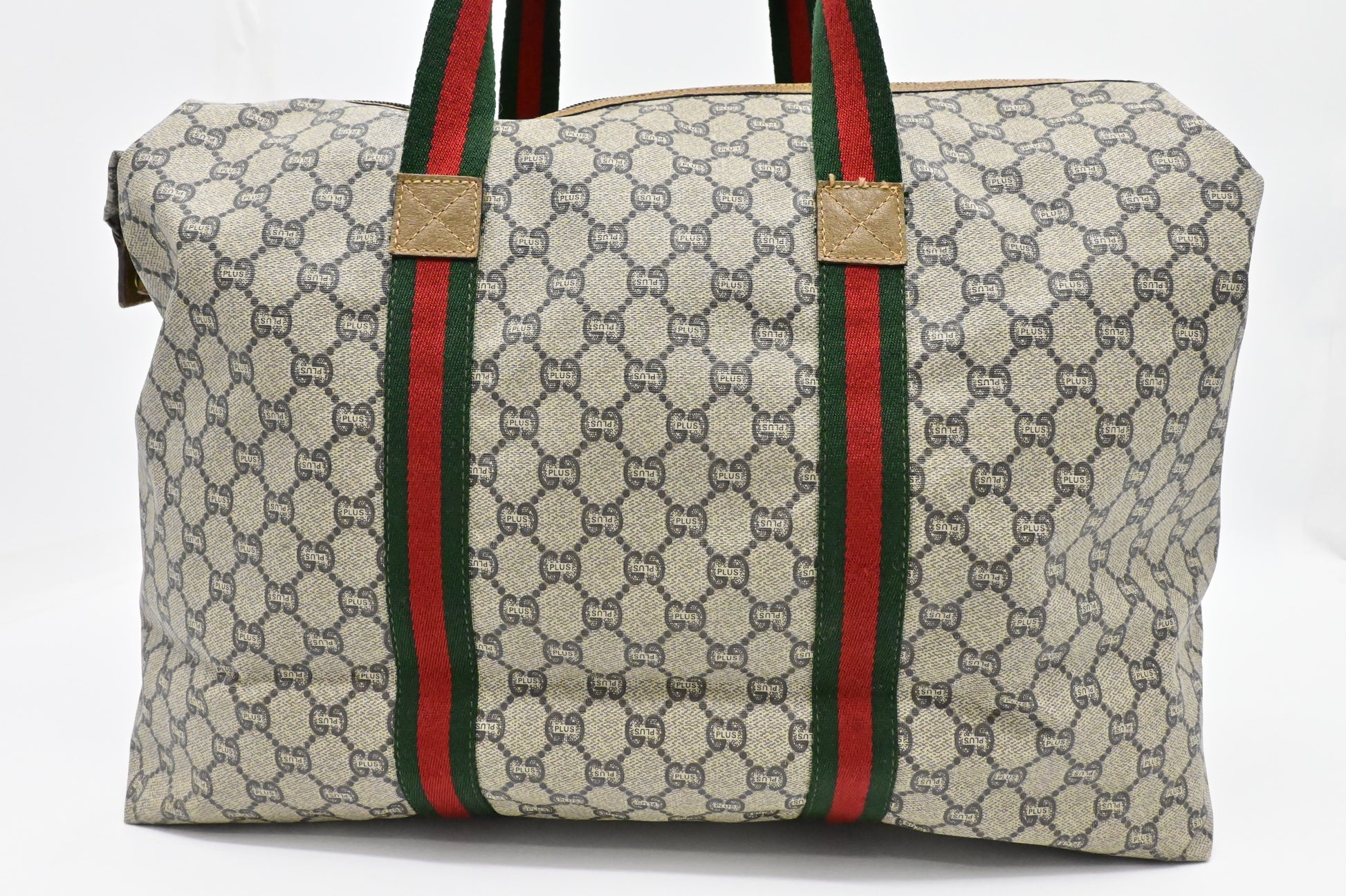 Gucci Plus Zipped Travel Bag in GG Plus Coated Canvas