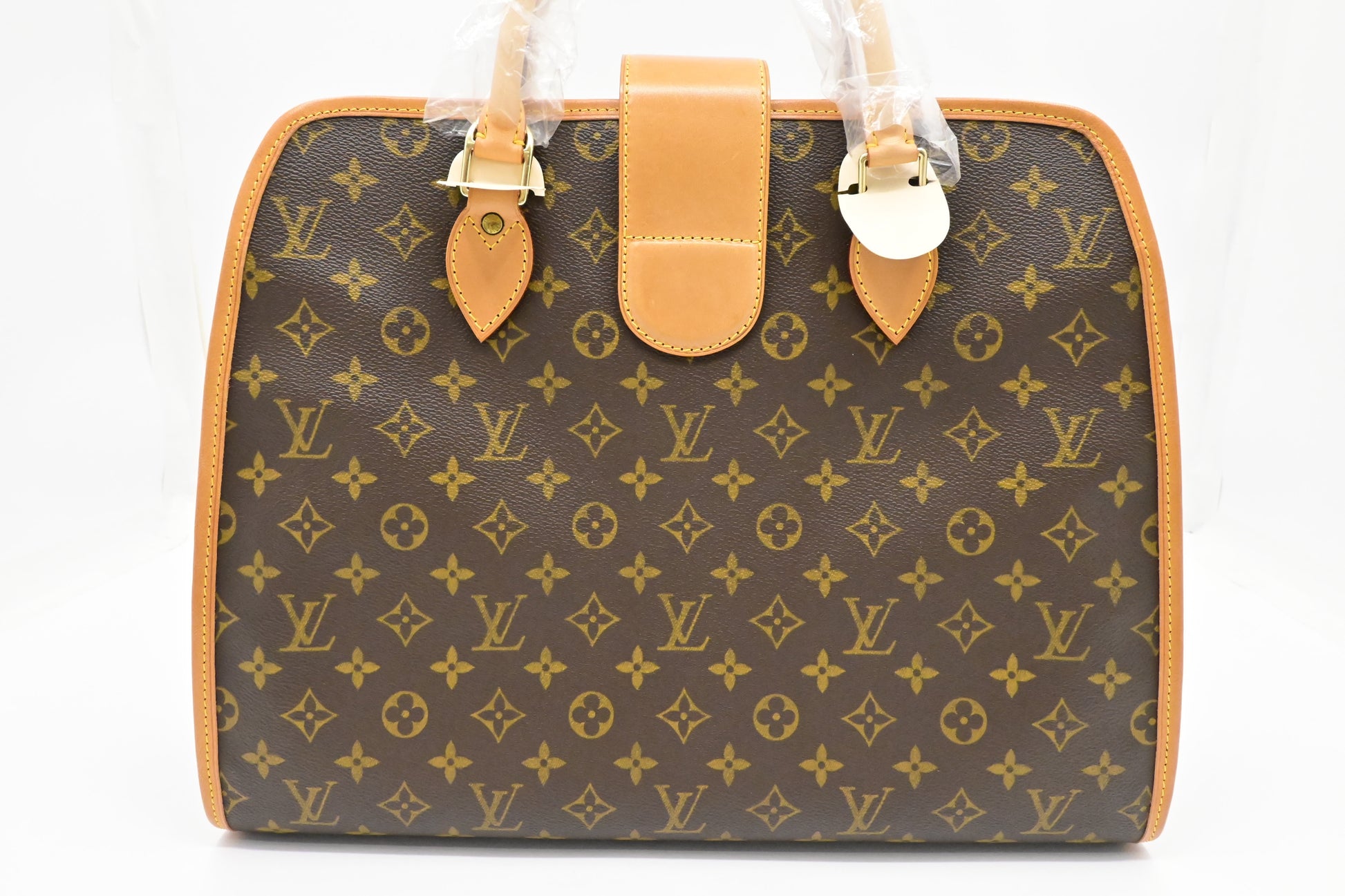 Louis Vuitton Rivoli in Monogram Canvas