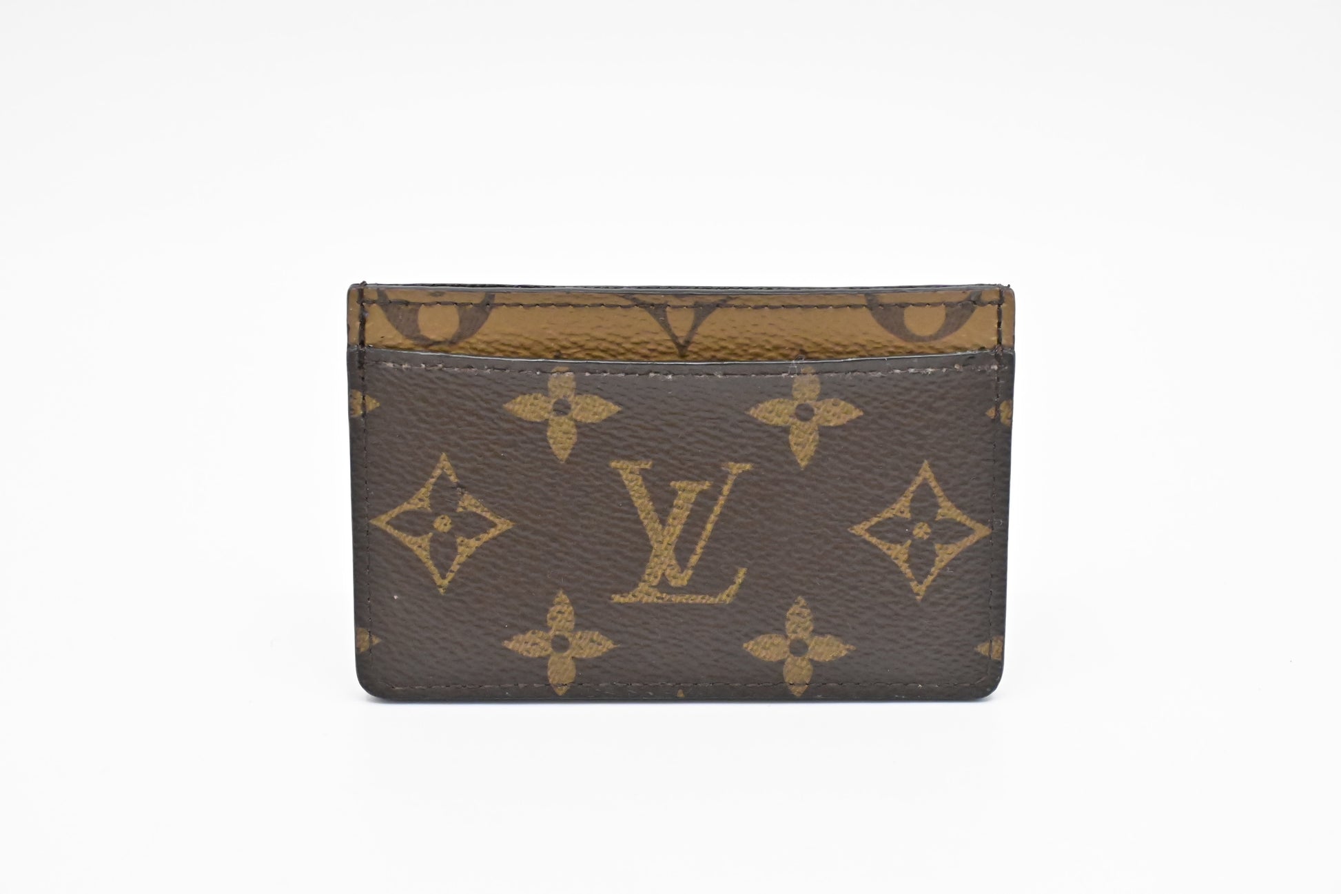 Louis Vuitton Card Case in Reverse Monogram Canvas