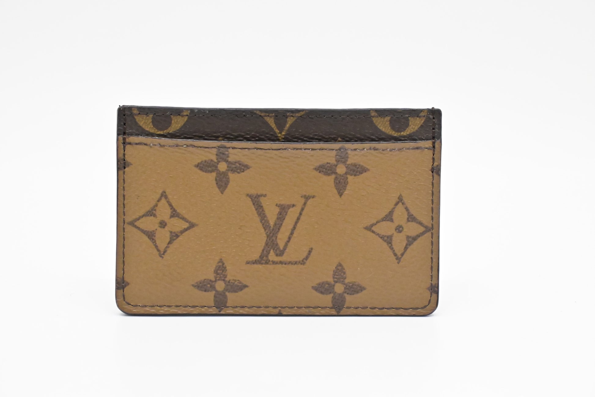 Louis Vuitton Card Case in Reverse Monogram Canvas