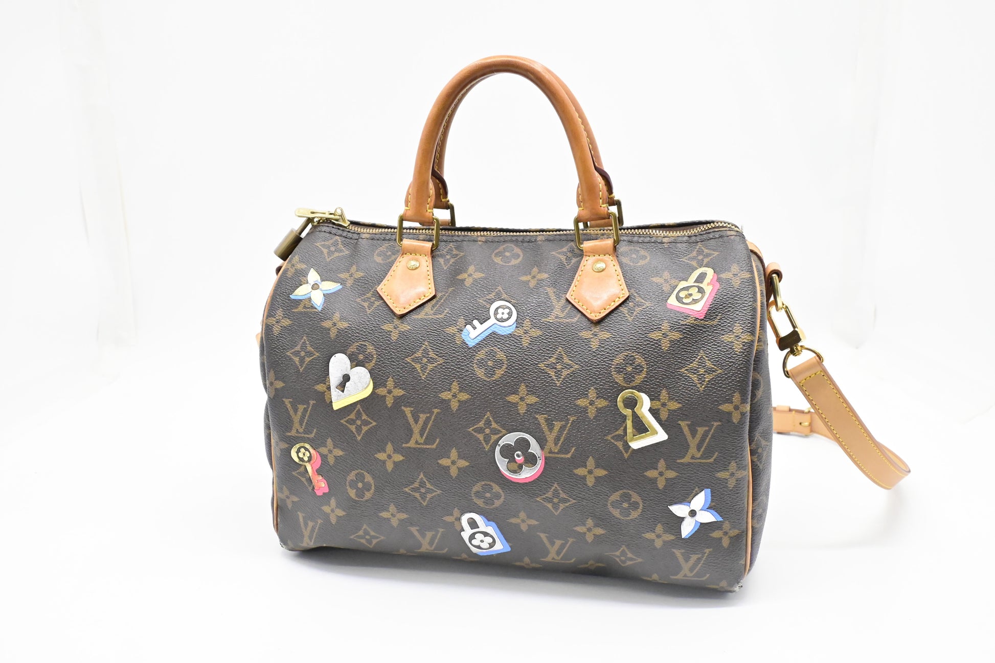 Louis Vuitton Speedy 30 Bandouliere in Love Lock Monogram Canvas