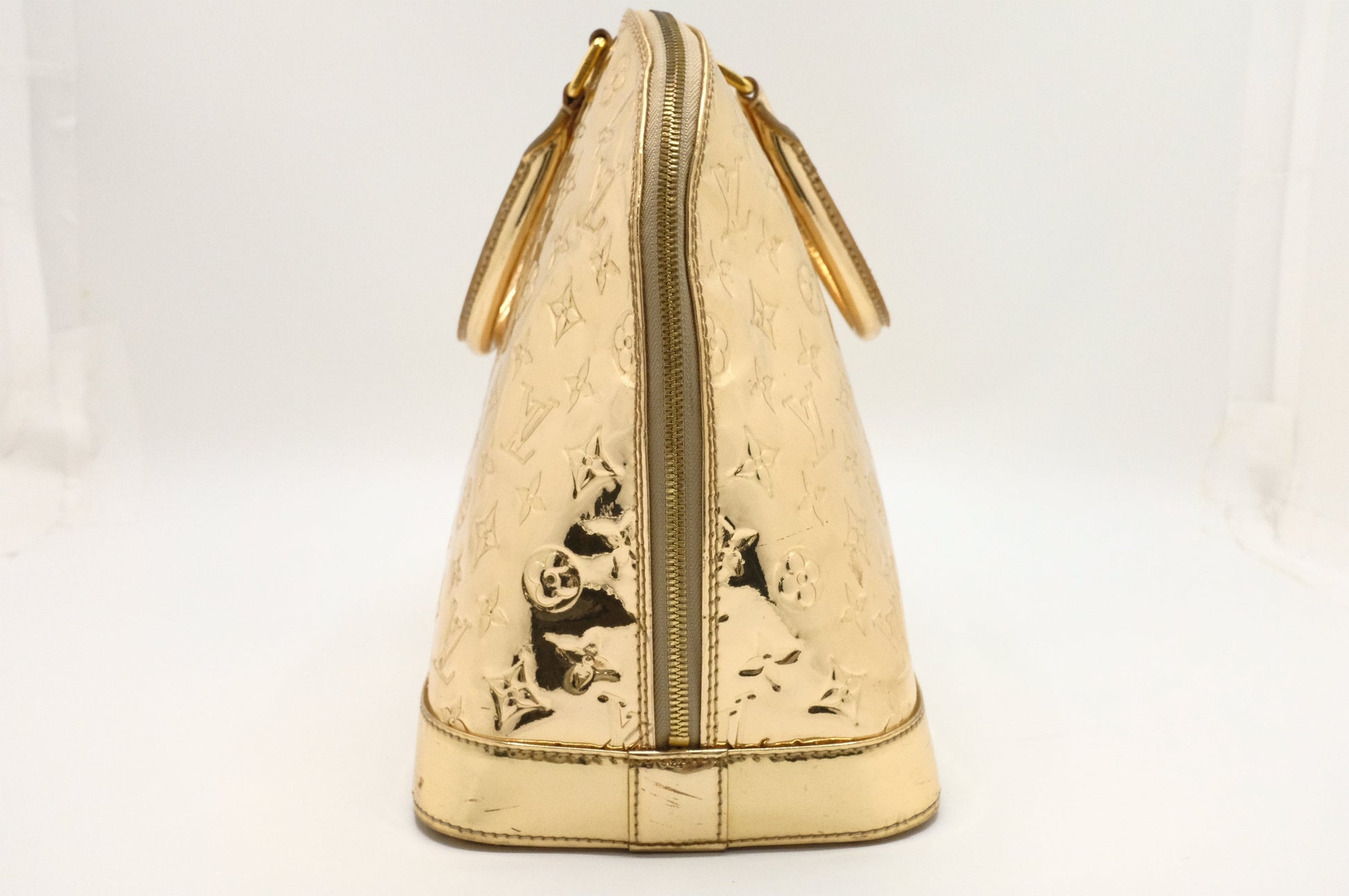 Louis Vuitton Alma GM in Gold Vernis Leather