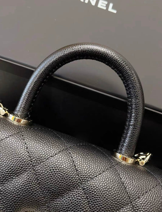 Chanel 24K o Coco Top Handle Flap Bag Black Caviar Light Gold Hardware
