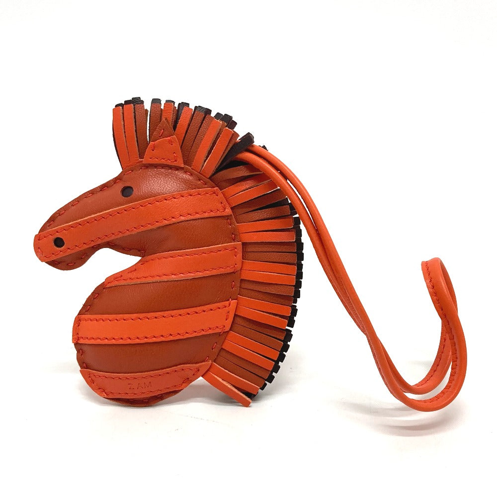 HERMES Bag charm lambskin Orange type zebra Gee Gee Savannah Women