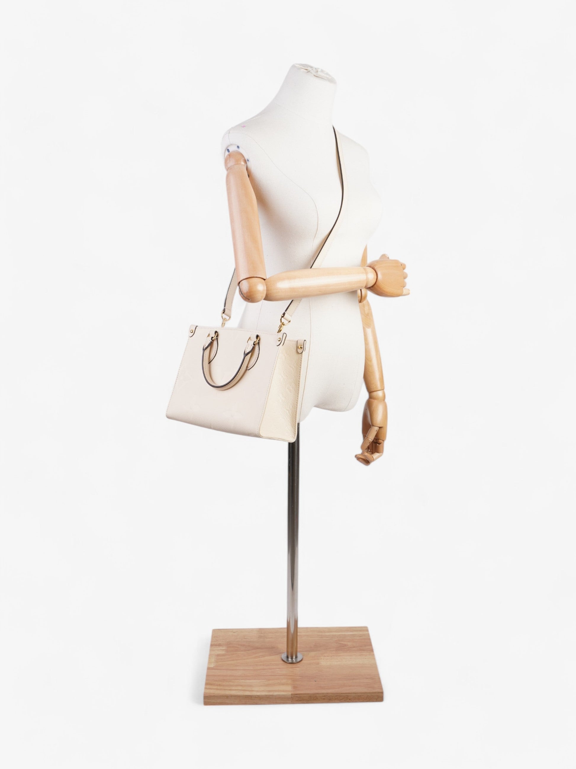 Louis Vuitton On the Go Creme Empreinte Leather PM