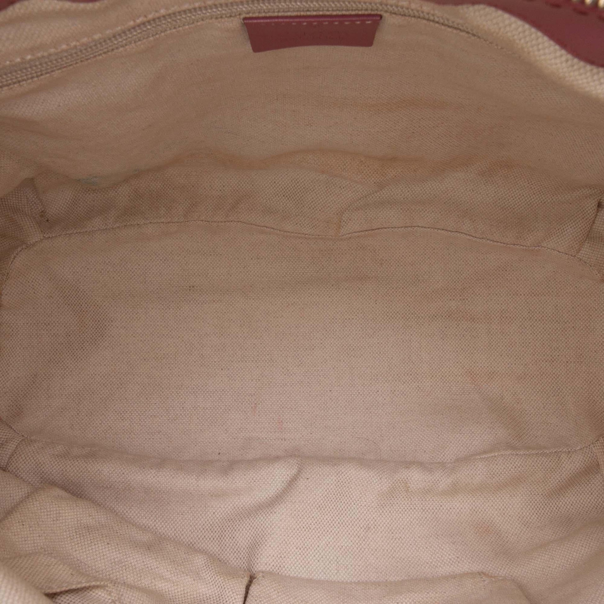 Gucci GG Canvas Sukey Satchel