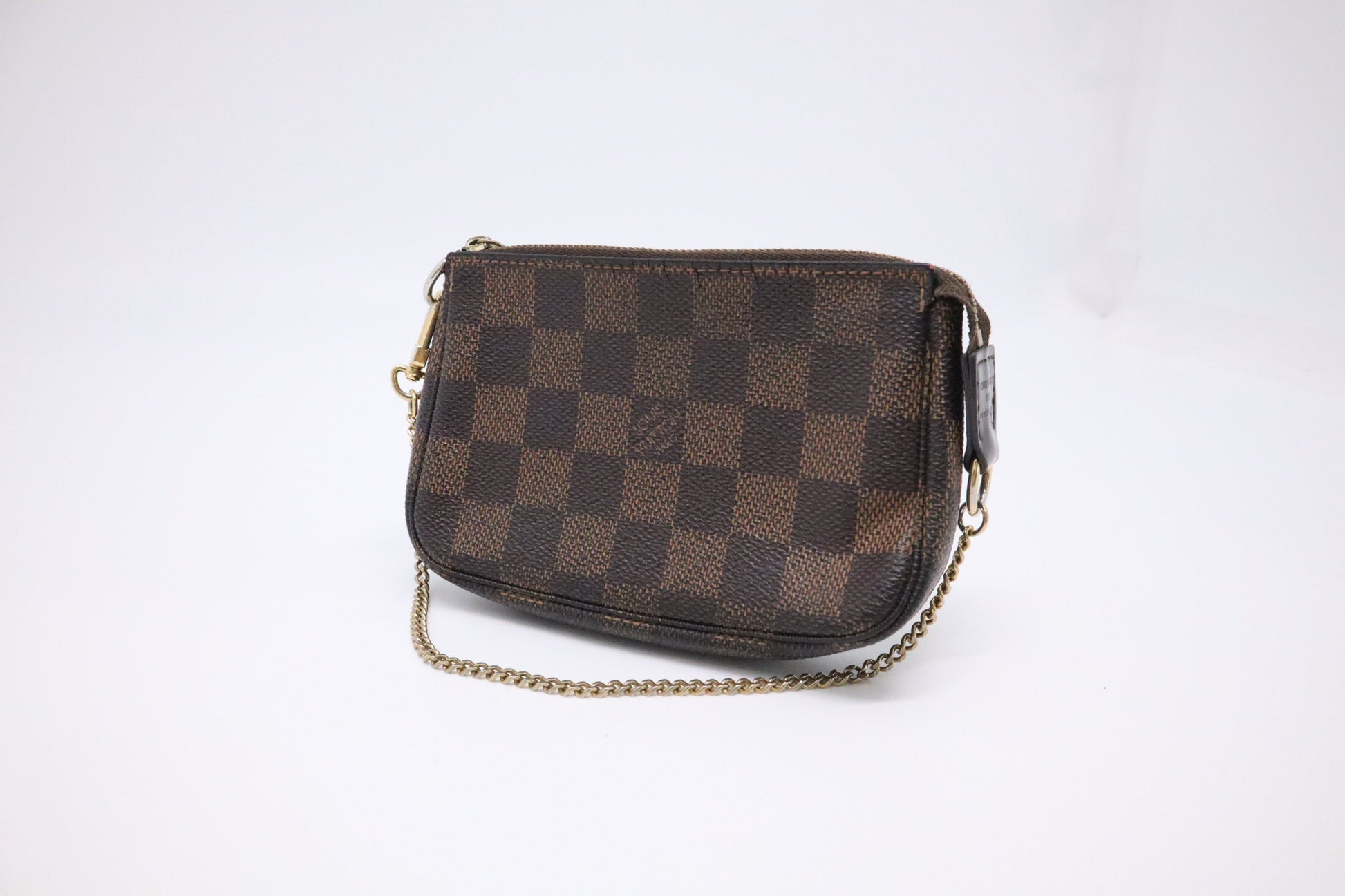 Louis Vuitton Mini Pochette Accessoires in Damier Ebene Canvas