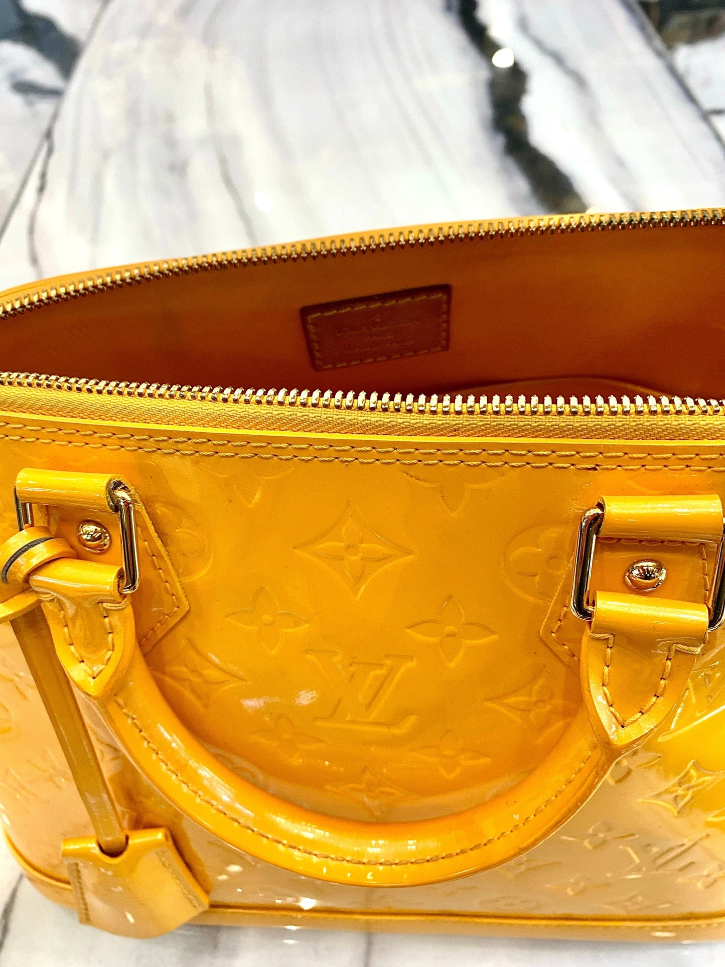 LOUIS VUITTON VERNIS ALMA PM