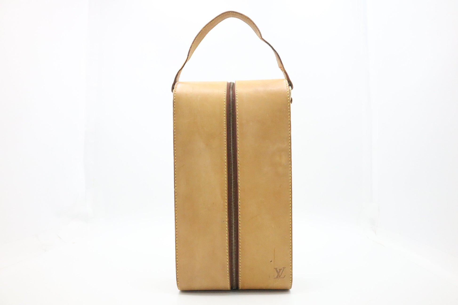 Louis Vuitton Bottle Carrier in Nomade Leather