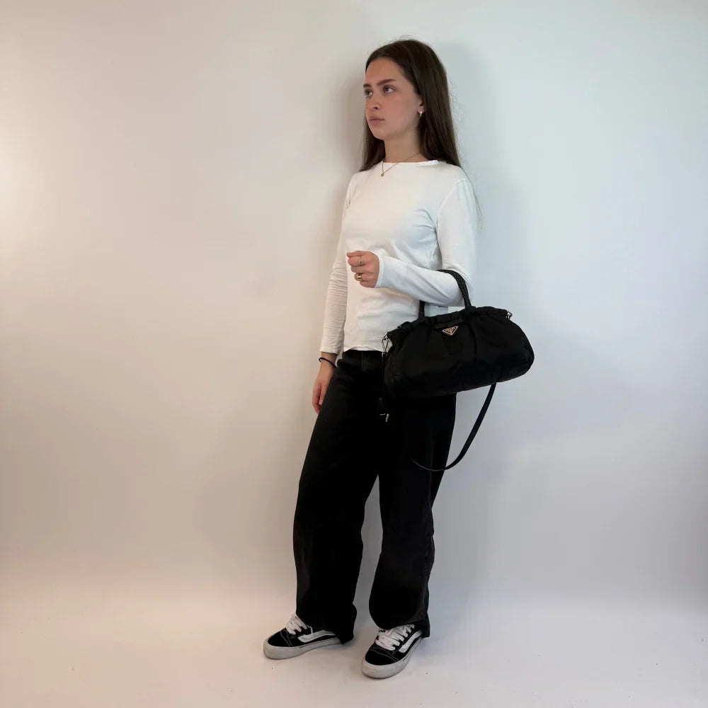 Prada handbag with shoulder strap made of nylon black