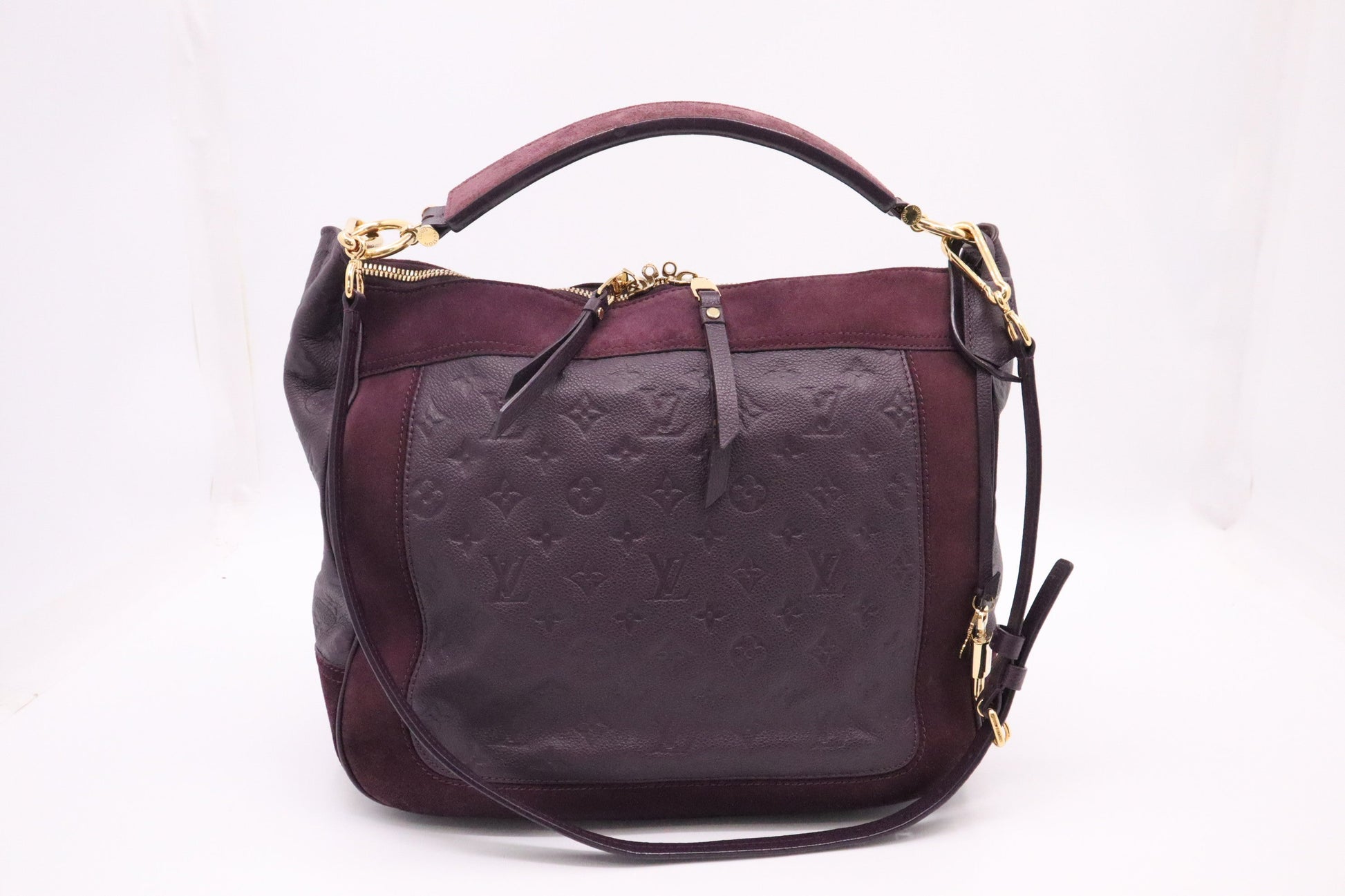 Louis Vuitton Audacie in Purple Empreinte Leather