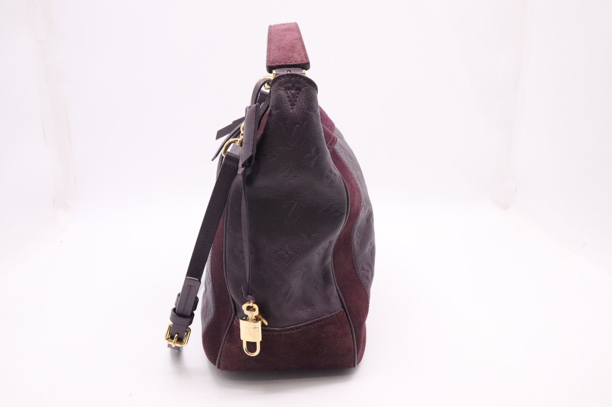 Louis Vuitton Audacie in Purple Empreinte Leather