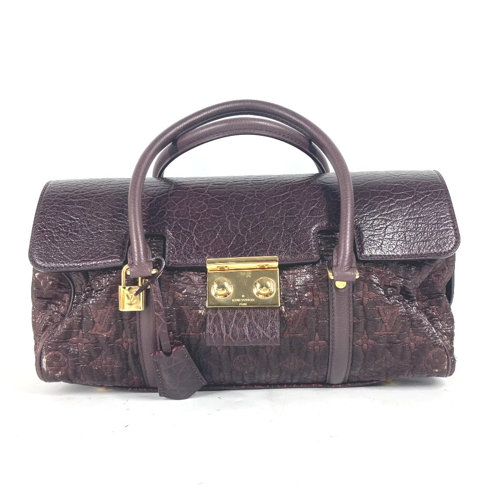 LOUIS VUITTON Handbag Coated canvas, leather purple Monogram Volupte Botte