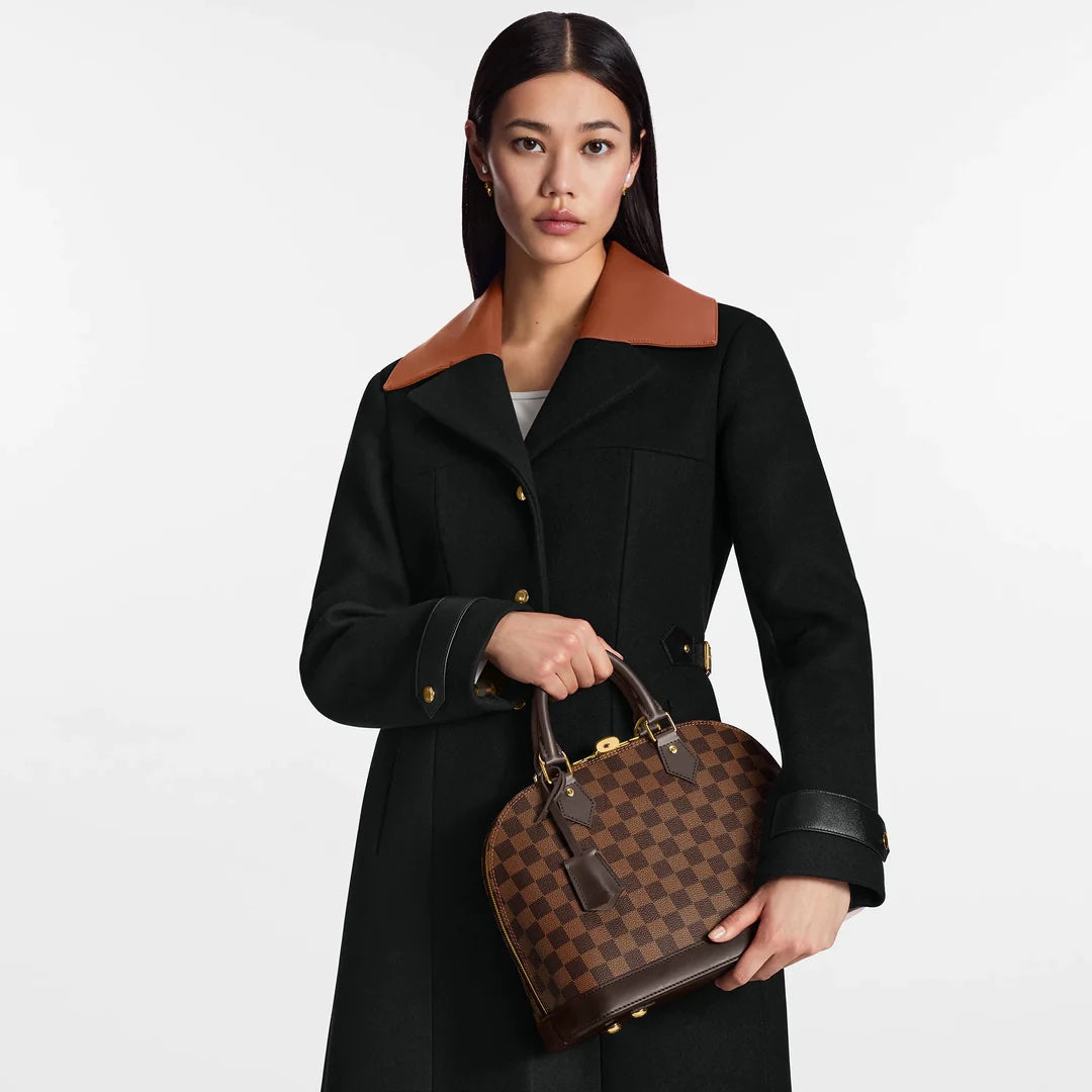 LOUIS VUITTON DAMIER EBENE ALMA PM HANDBAG