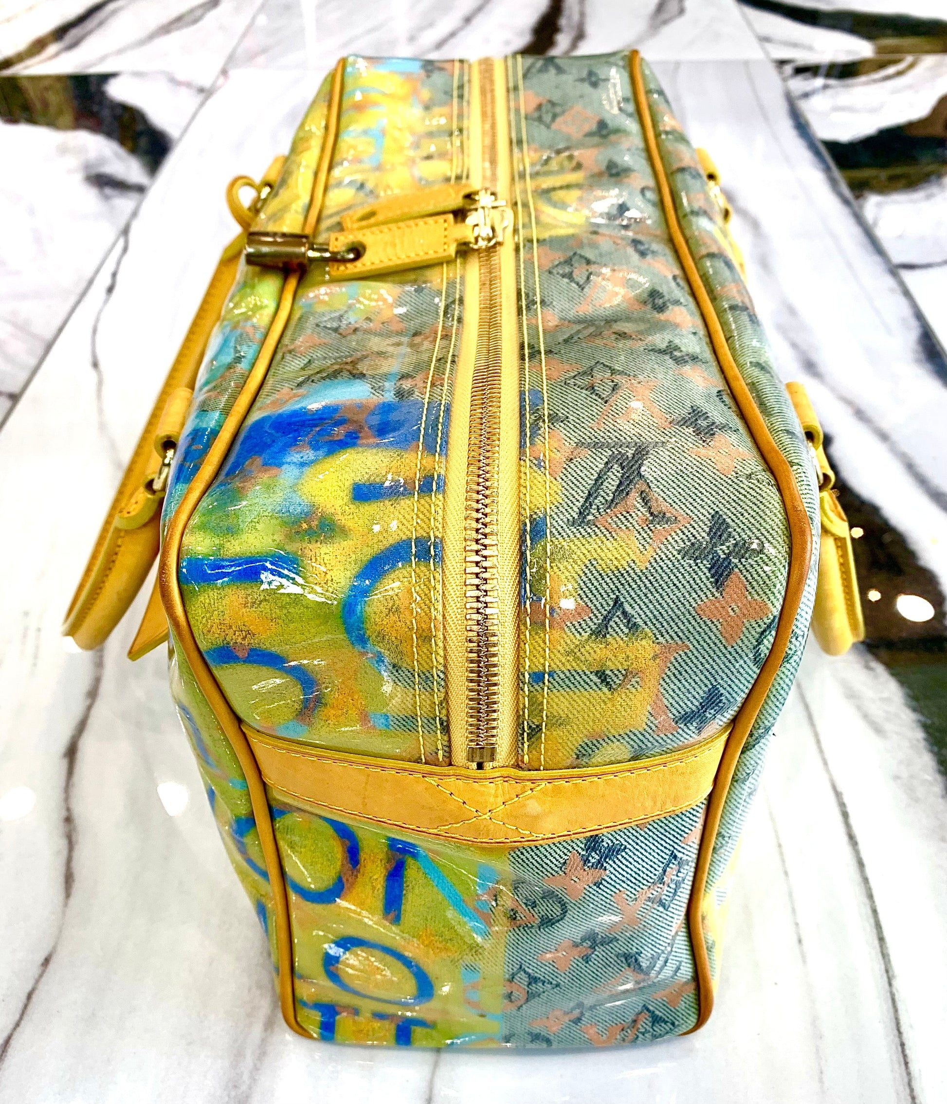 LOUIS VUITTON MULTI-COLOR MONOGRAM PULP WEEKENDER PM