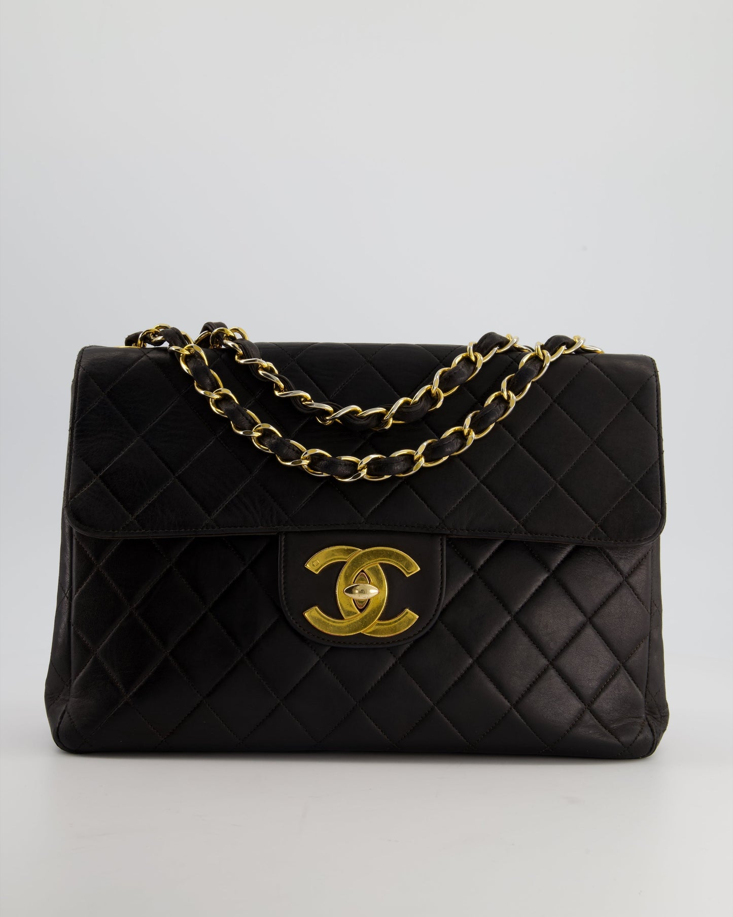Chanel Black Maxi Mademoiselle Single Flap Bag in Lambskin with 24K Gold Hardware