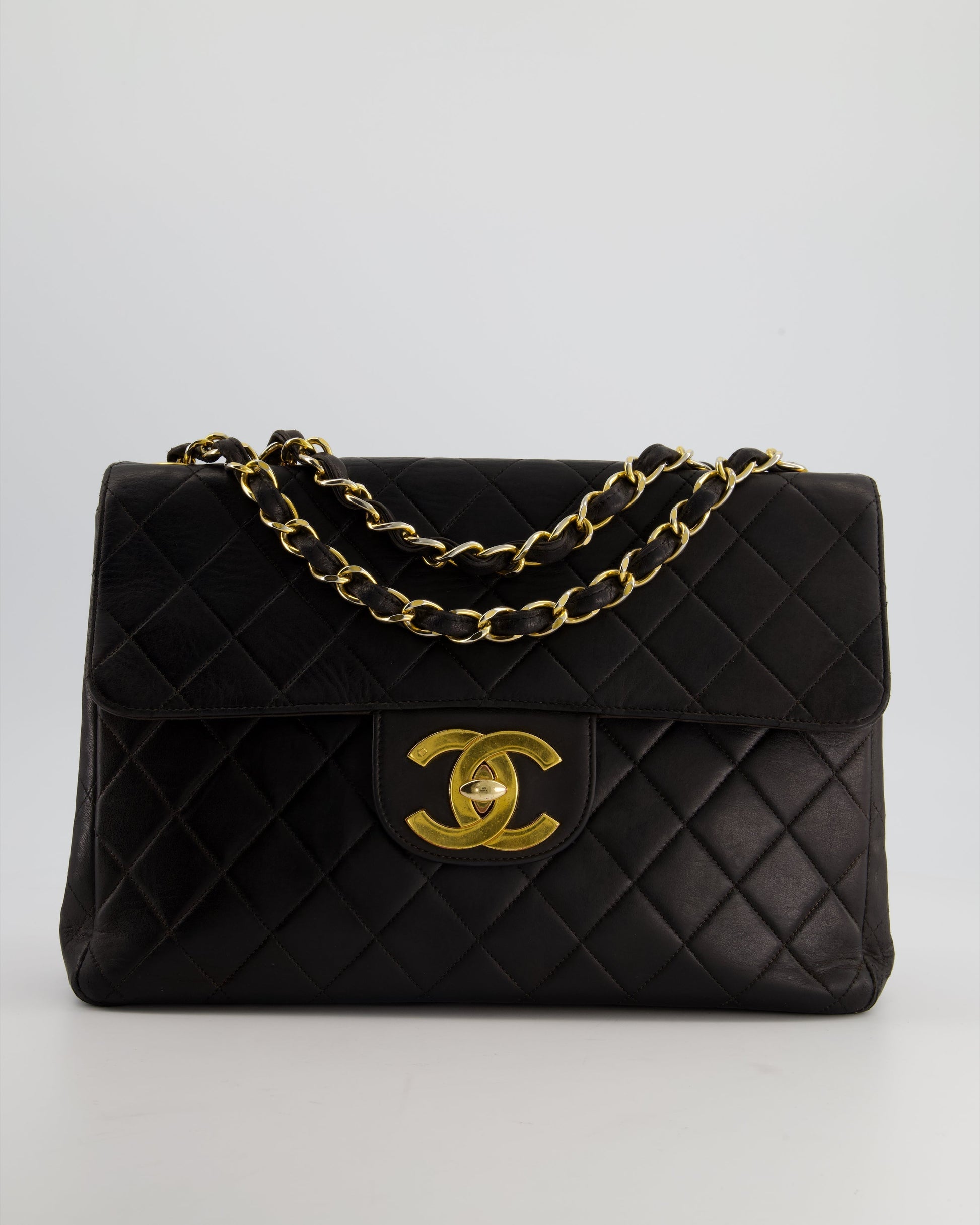 Chanel Black Maxi Mademoiselle Single Flap Bag in Lambskin with 24K Gold Hardware