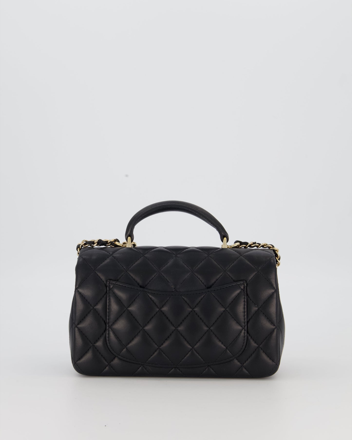 Chanel Black Mini Rectangular Top Handle Flap Bag in Lambskin Leather with Champagne Hardware and Strass Removable Bow Charm