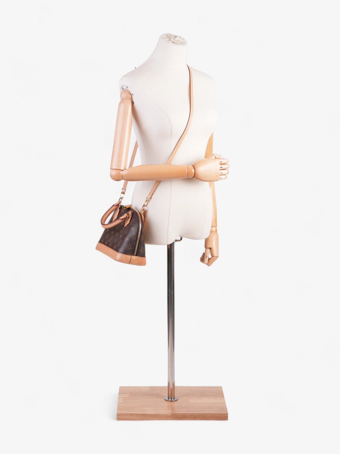 Louis Vuitton Alma Monogram Coated Canvas BB