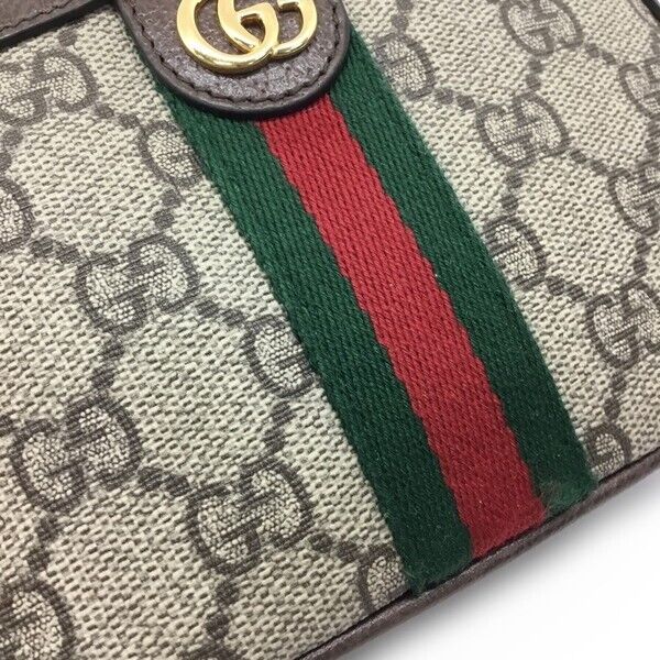 Gucci Monogram Canvas Clutch