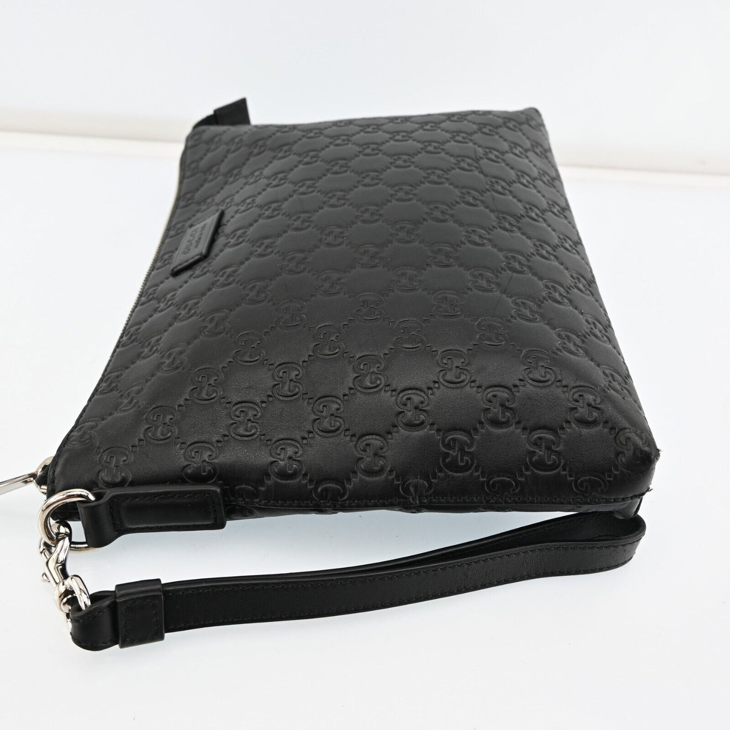 Gucci Monogram Leather Clutch