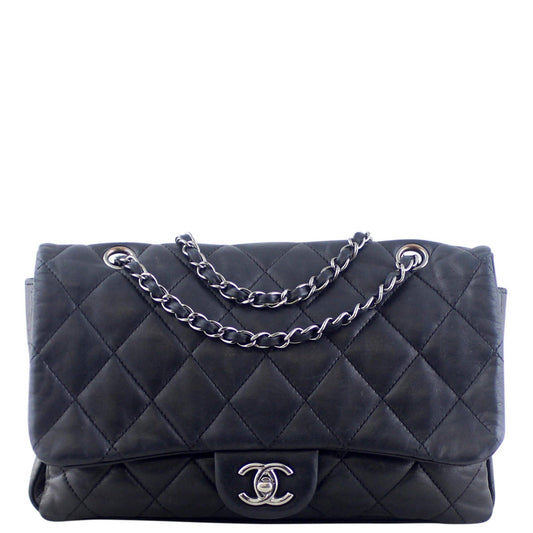 Chanel Soft Quilted Three-Pouch Flap Bag