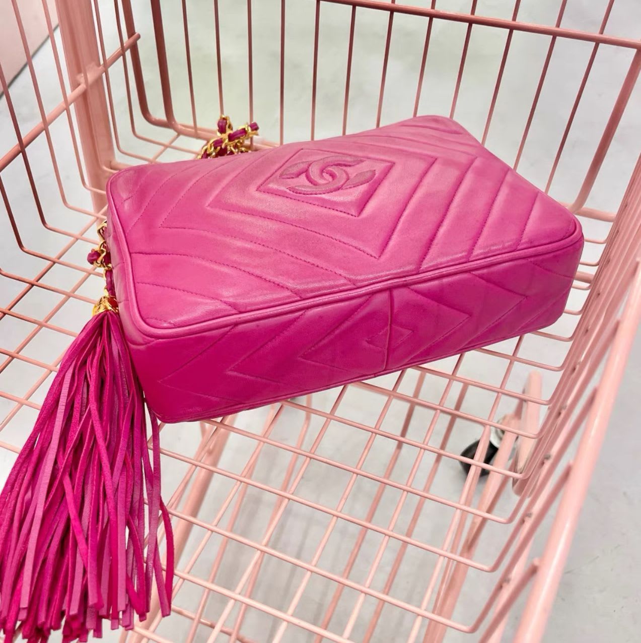 Chanel rose red lambskin tassel bag