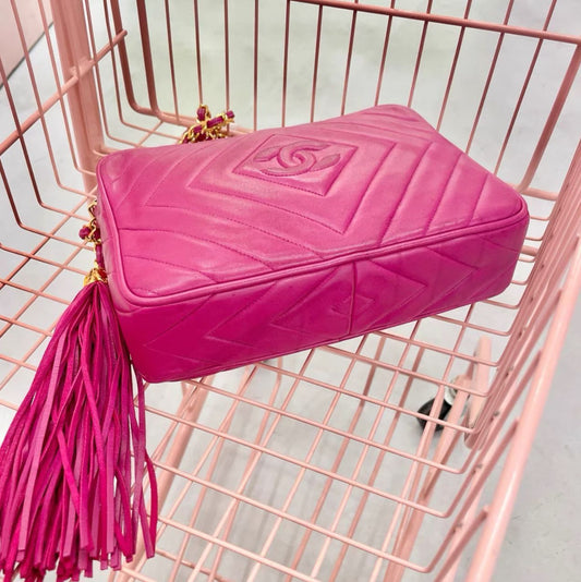 Chanel rose red lambskin tassel bag
