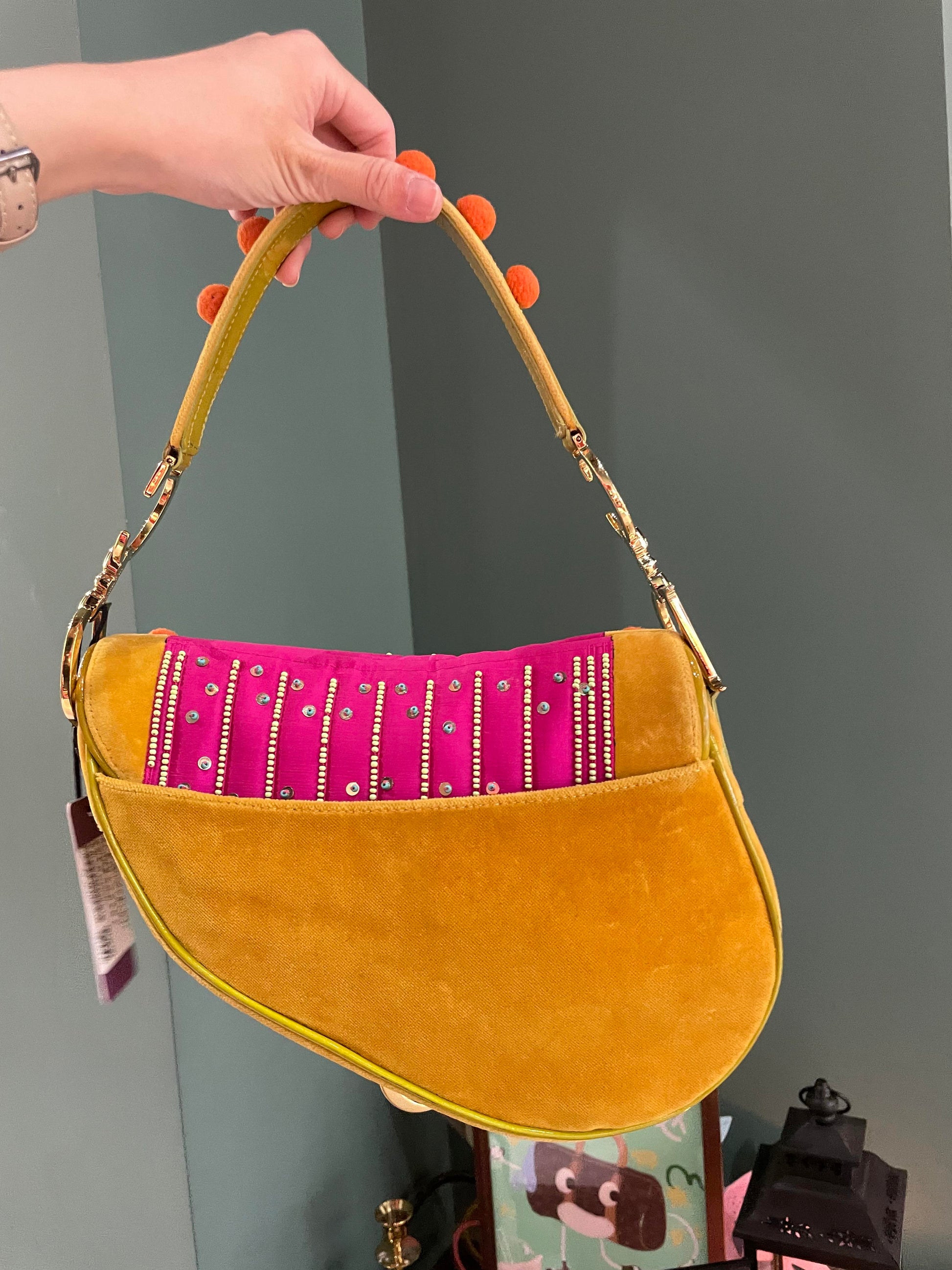 Limited Edition John Galliano era Dior Saddle bag with pompom and bead