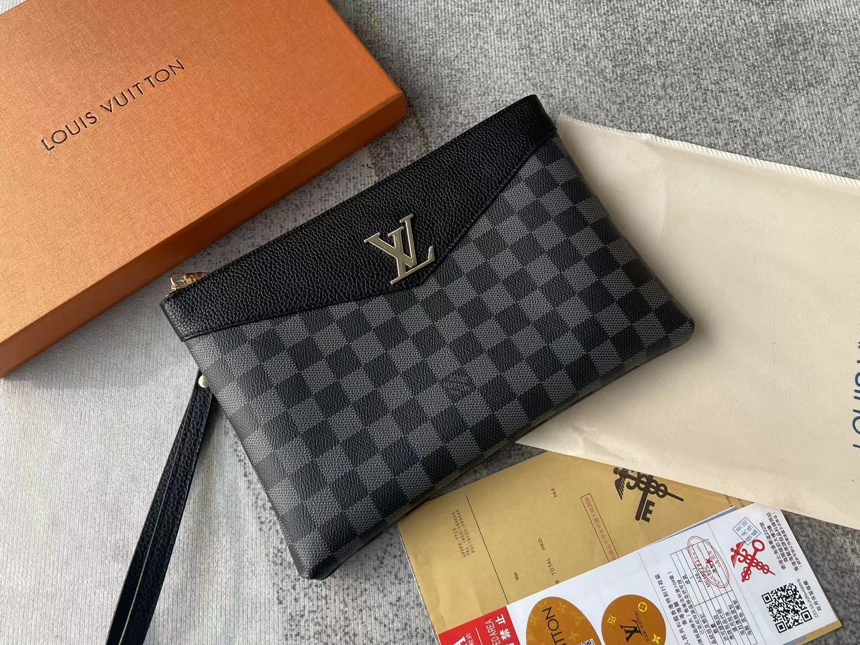 Louis vuitton handbag (wristlet bag)
